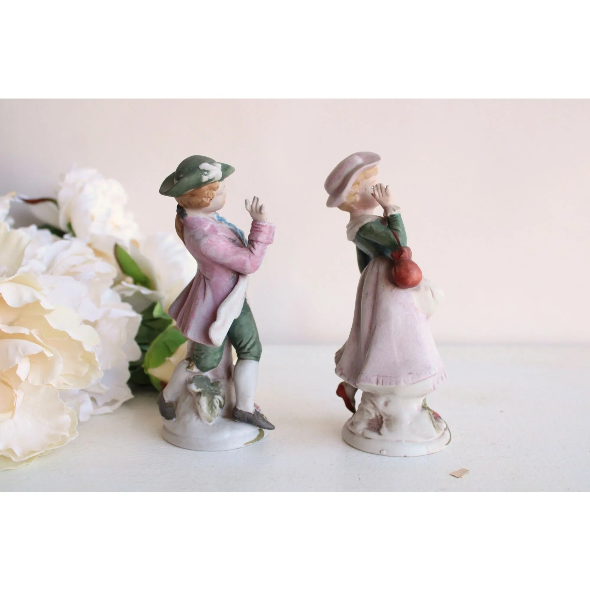 Vintage Bisque Porcelain Man and Woman Figurines