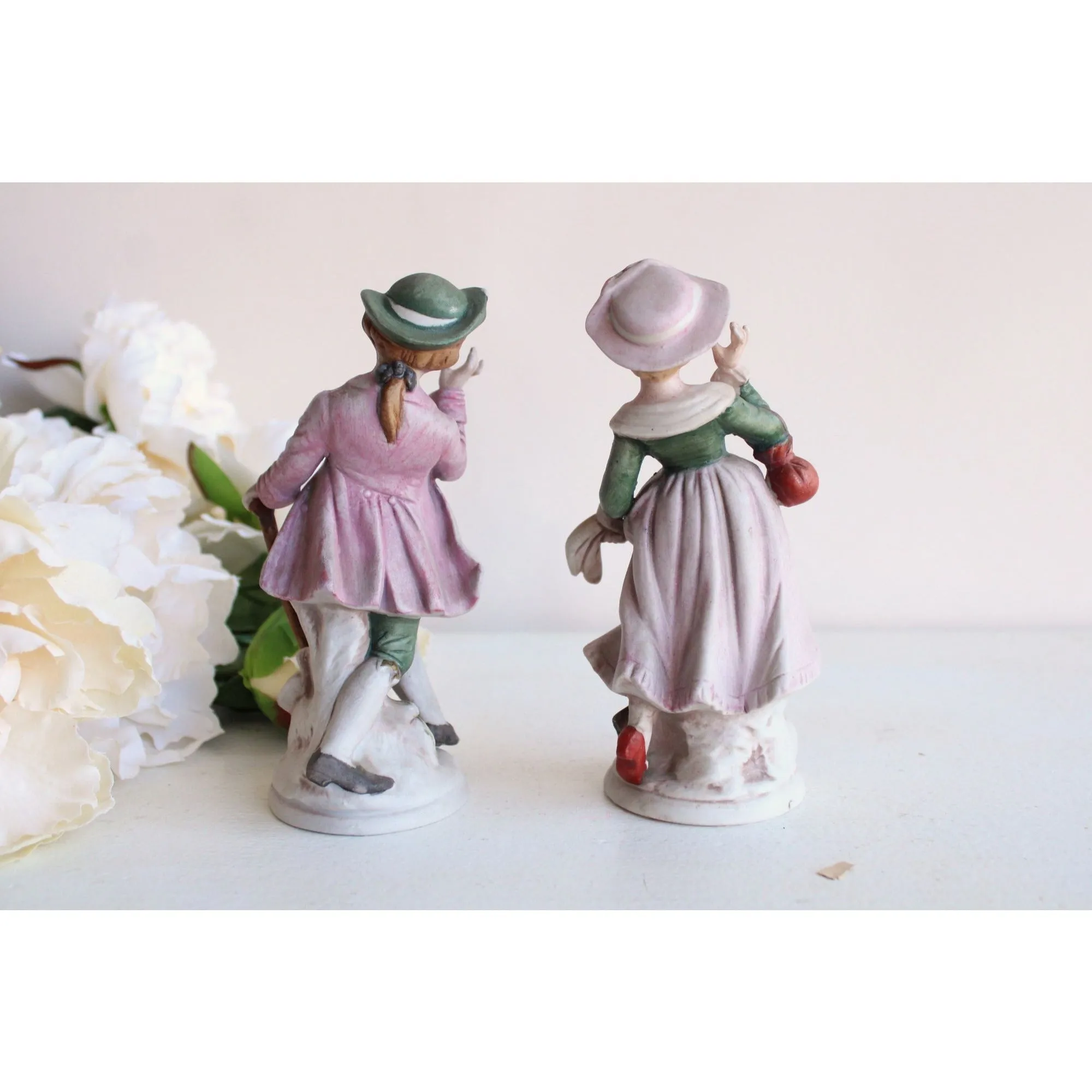 Vintage Bisque Porcelain Man and Woman Figurines