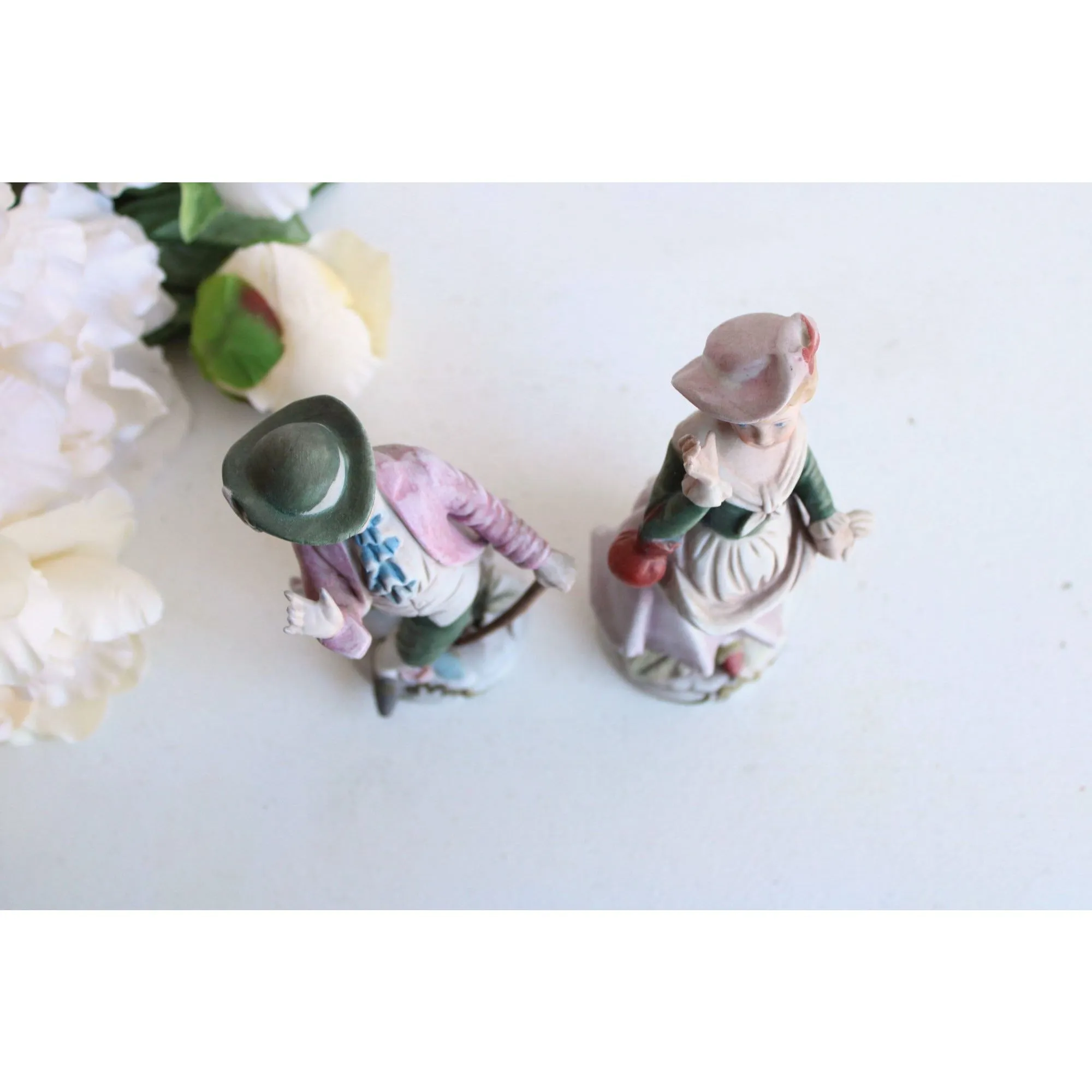 Vintage Bisque Porcelain Man and Woman Figurines