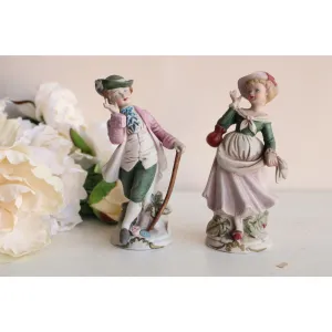 Vintage Bisque Porcelain Man and Woman Figurines